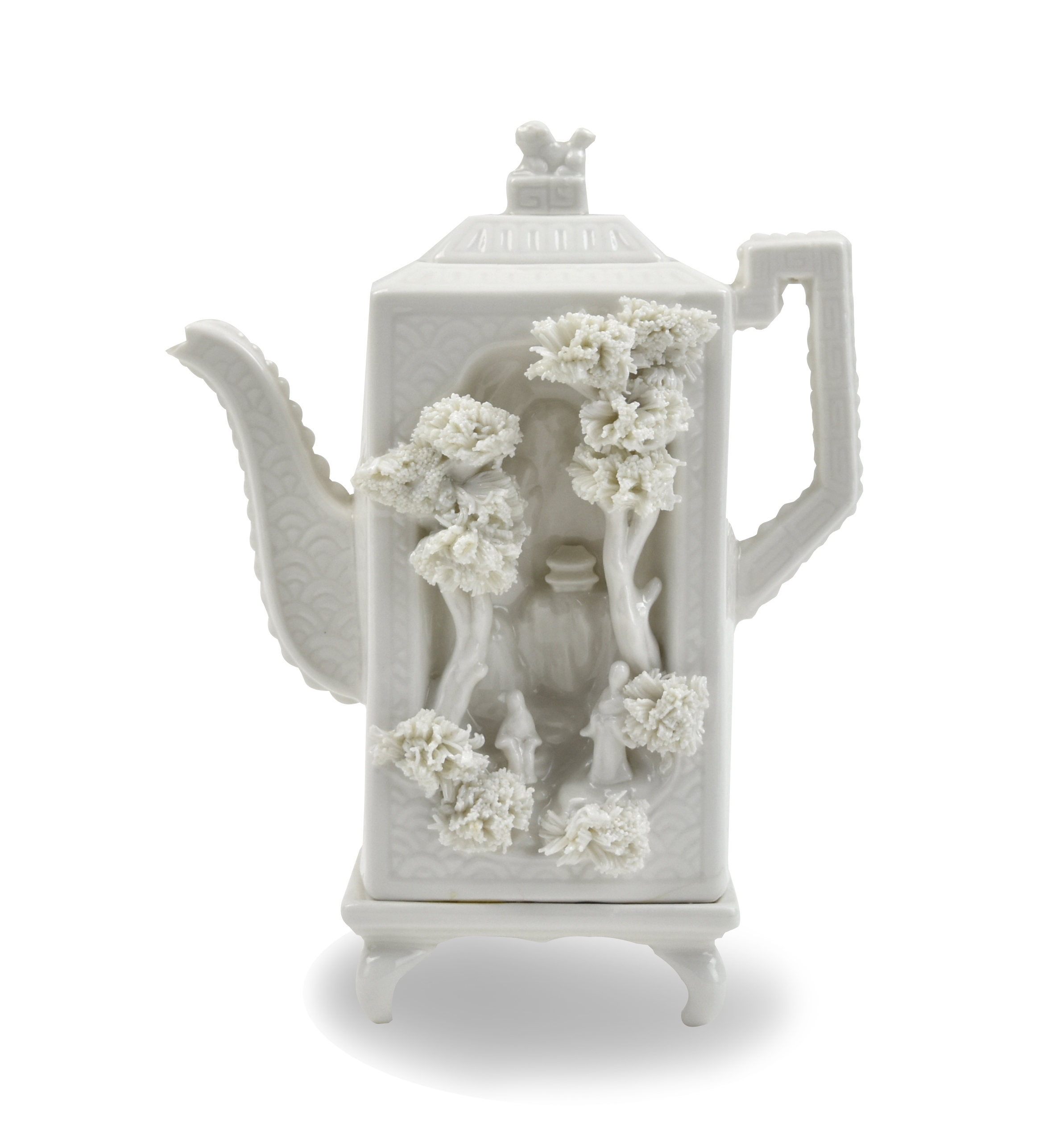 Appraisal: a rectangular white glazed tea pot molded with trees figures