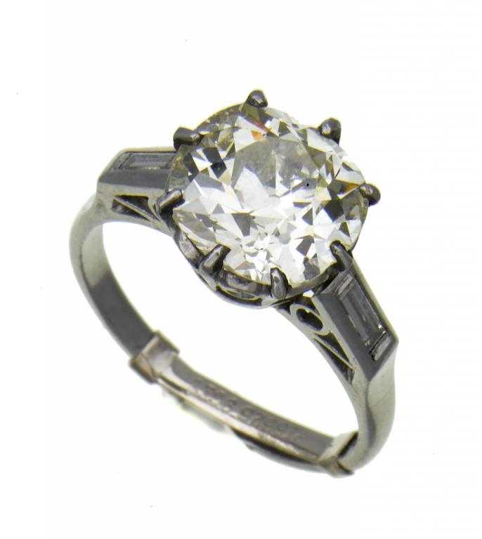 Appraisal: A DIAMOND SOLITAIRE RING the cushion shaped brilliant cut diamond