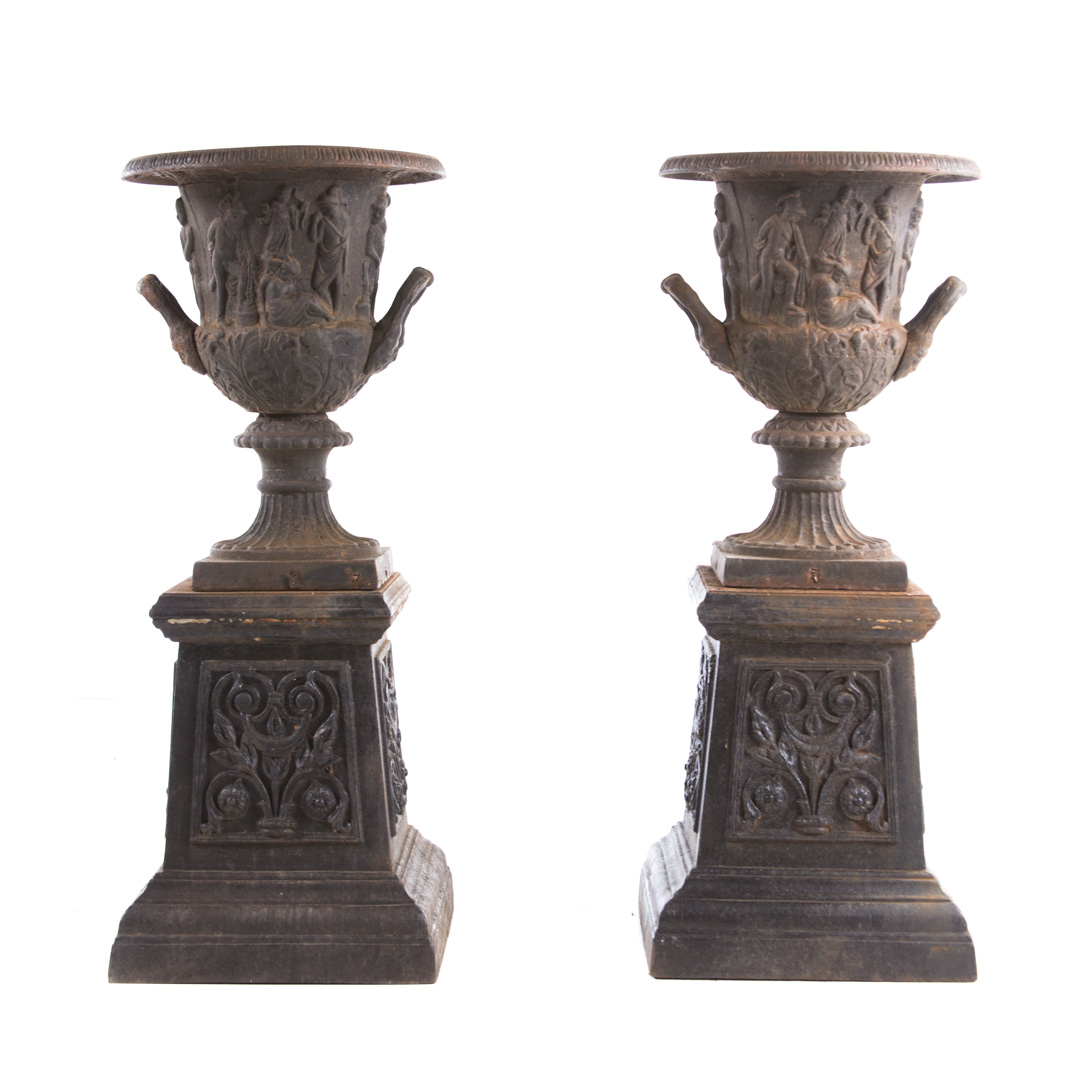 Appraisal: Pair Victorian style cast iron garden urns classical style double