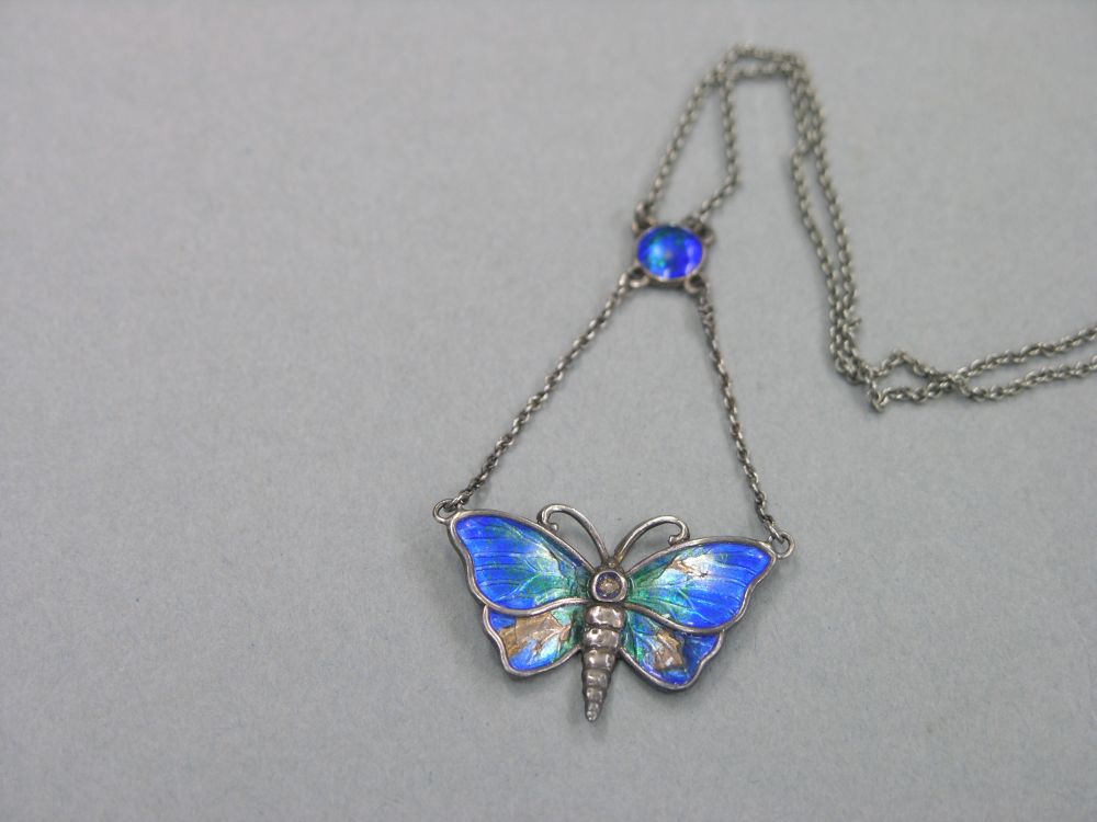 Appraisal: An early th century enamelled silver butterfly pendant blue and