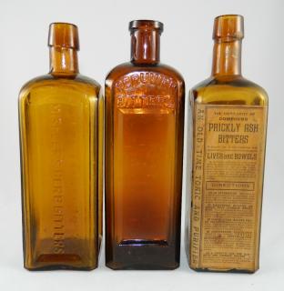 Appraisal: Bitters- amber square bottles- marked vertically in three panels 'Mishler's