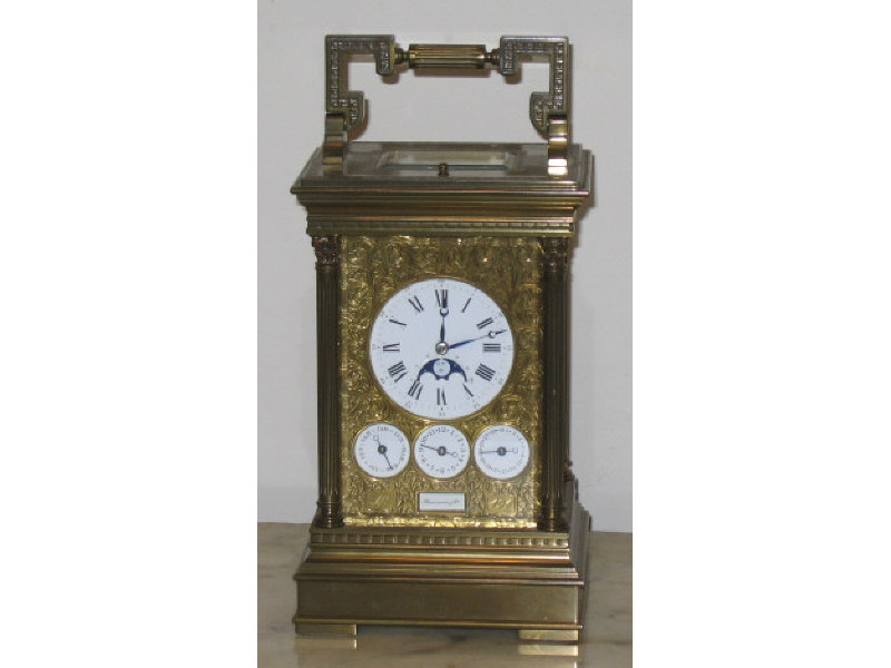 Appraisal: FRENCH BRONZE CARRIAGE CLOCK Hausmann Co eleven jewels enamel Roman