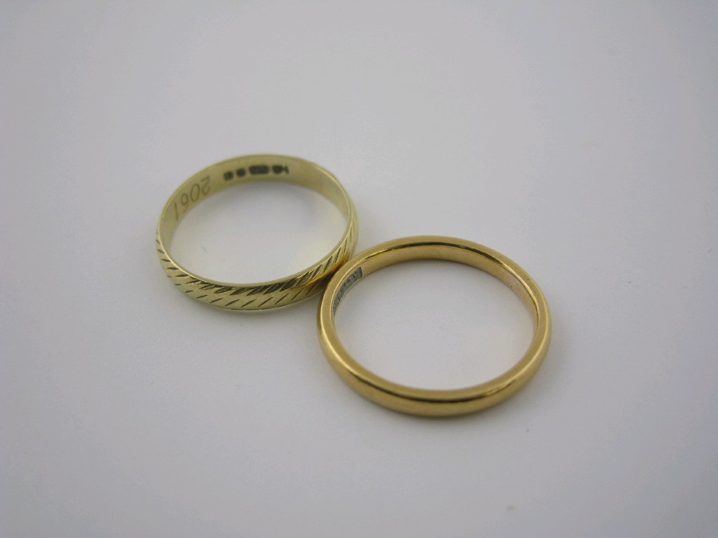 Appraisal: A ct gold Wedding Band and an ct gold Wedding