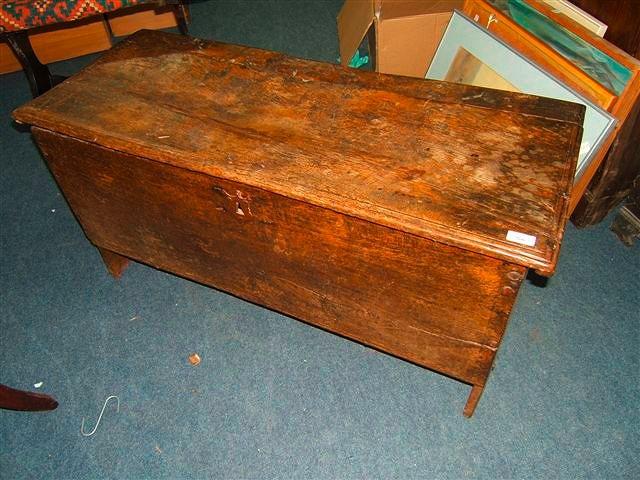 Appraisal: An antique oak six-plank coffer wide