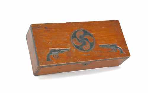 Appraisal: Carved and painted desk box having two revolvers centering a