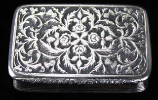 Appraisal: snuff box with fine thistle and floral motif repousse lid