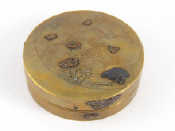 Appraisal: A Japanese Shibayama brass circular box with white metal bird