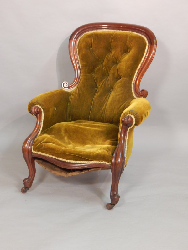 Appraisal: A Victorian mahogany show frame chair with a padded back