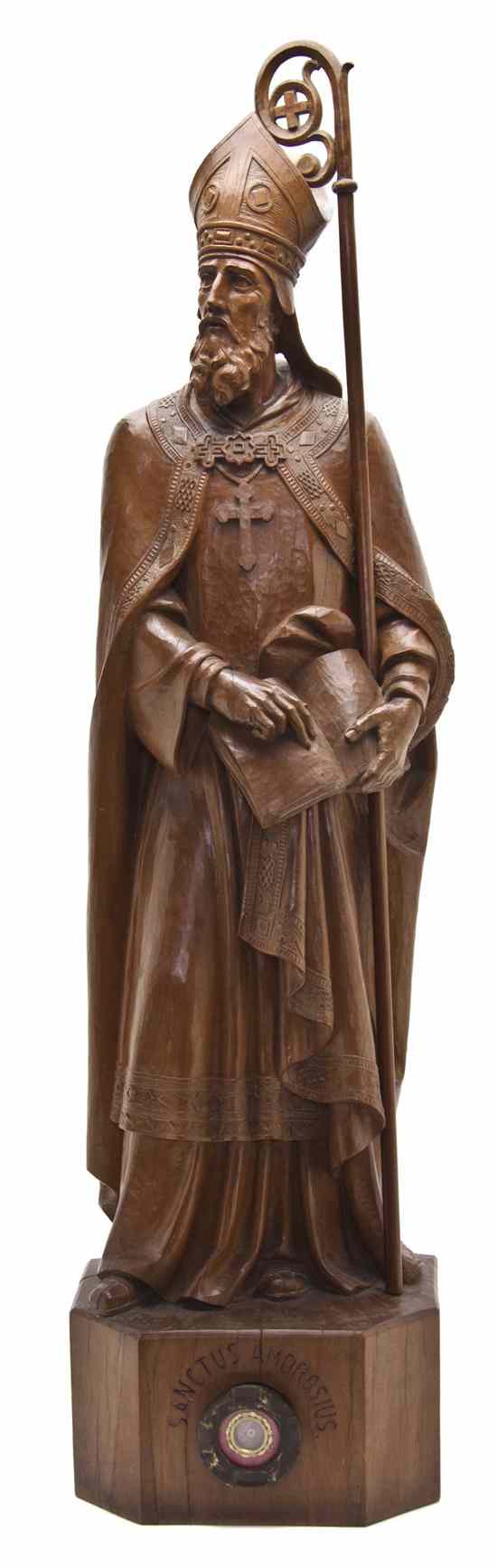 Appraisal: A Continental Carved Figure of a Bishop depicted standing in