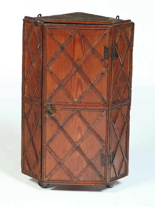 Appraisal: GEORGIAN-STYLE HANGING CORNER CUPBOARD England late th-early th century pine