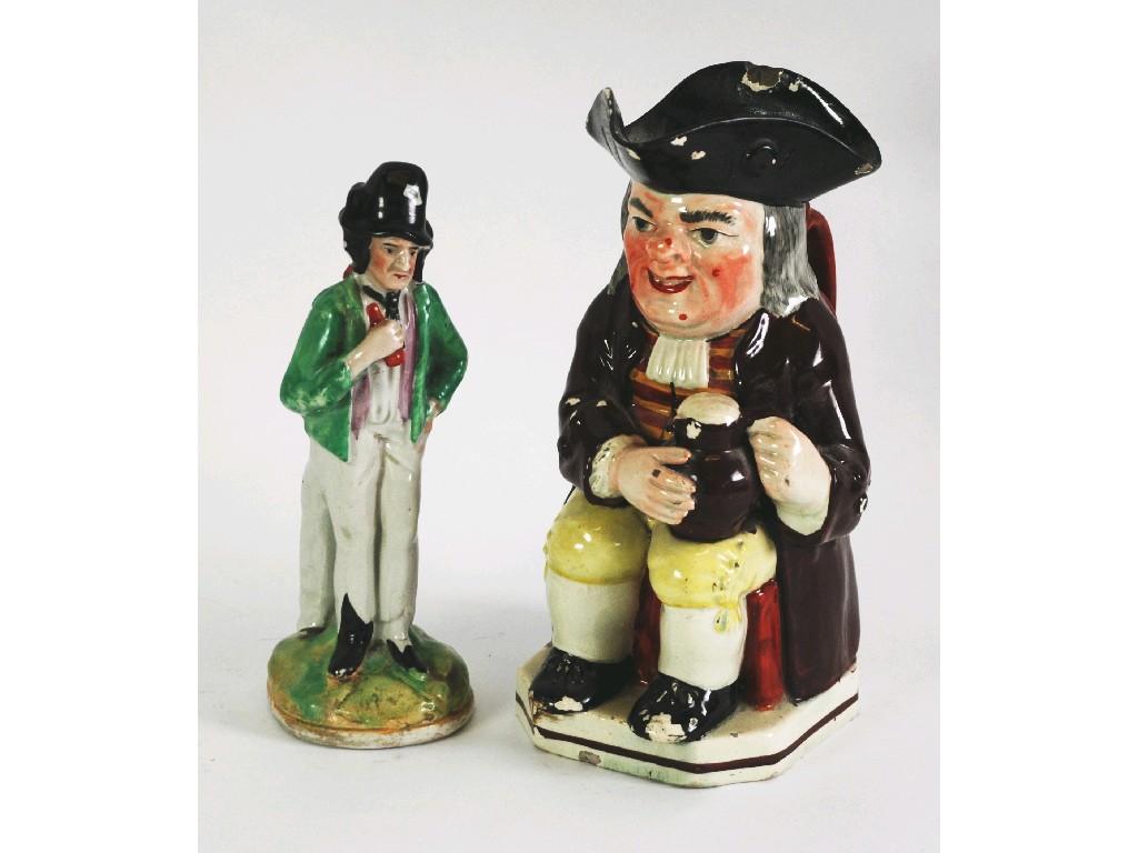 Appraisal: STAFFORDSHIRE TWO SIDED POTTERY FIGURE OF A SAILOR on oval