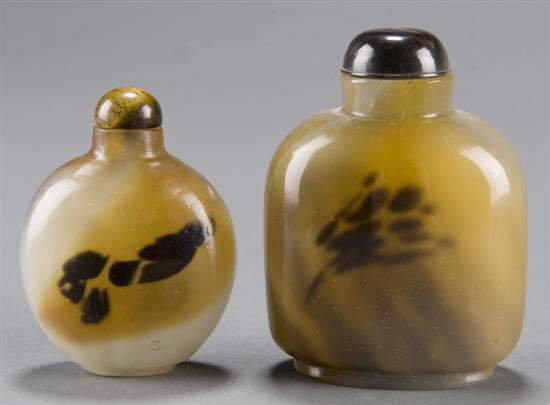 Appraisal: Two Chinese glass snuff bottles imitating shadow agate c Coloring