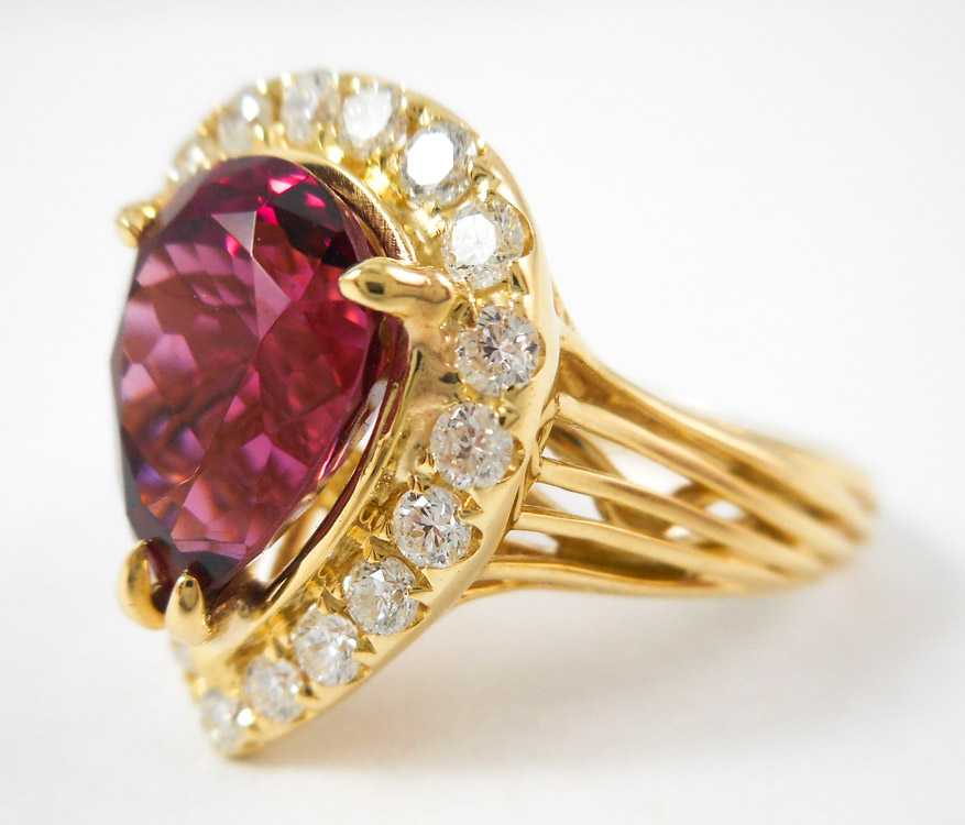 Appraisal: RUBELLITE DIAMOND AND FOURTEEN KARAT GOLD RING The yellow gold