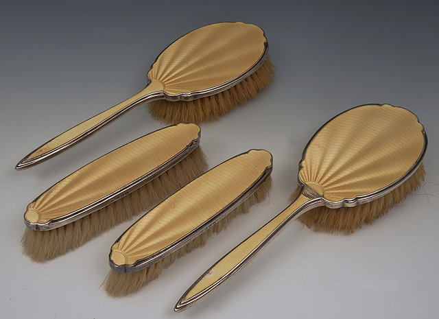 Appraisal: AN ELKINGTON CO silver and yellow enamelled dressing set to