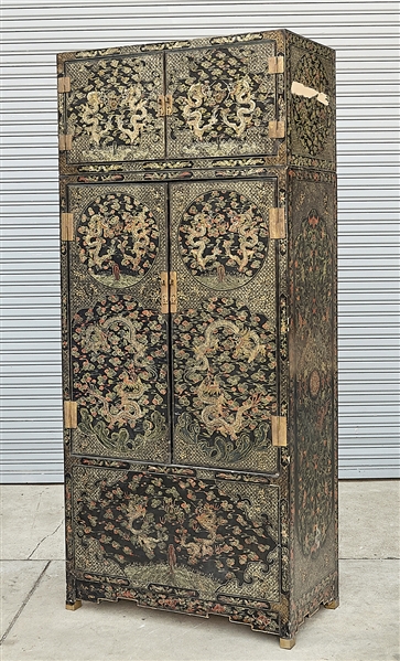 Appraisal: Tall Chinese painted wood two-piece cabinet dragons chasing pearls with