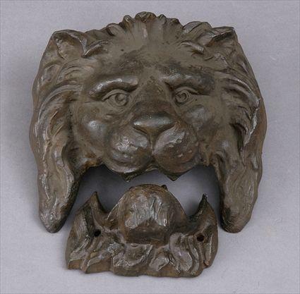 Appraisal: LION FOUNTAIN HEAD A cast-iron wall fountain head in the