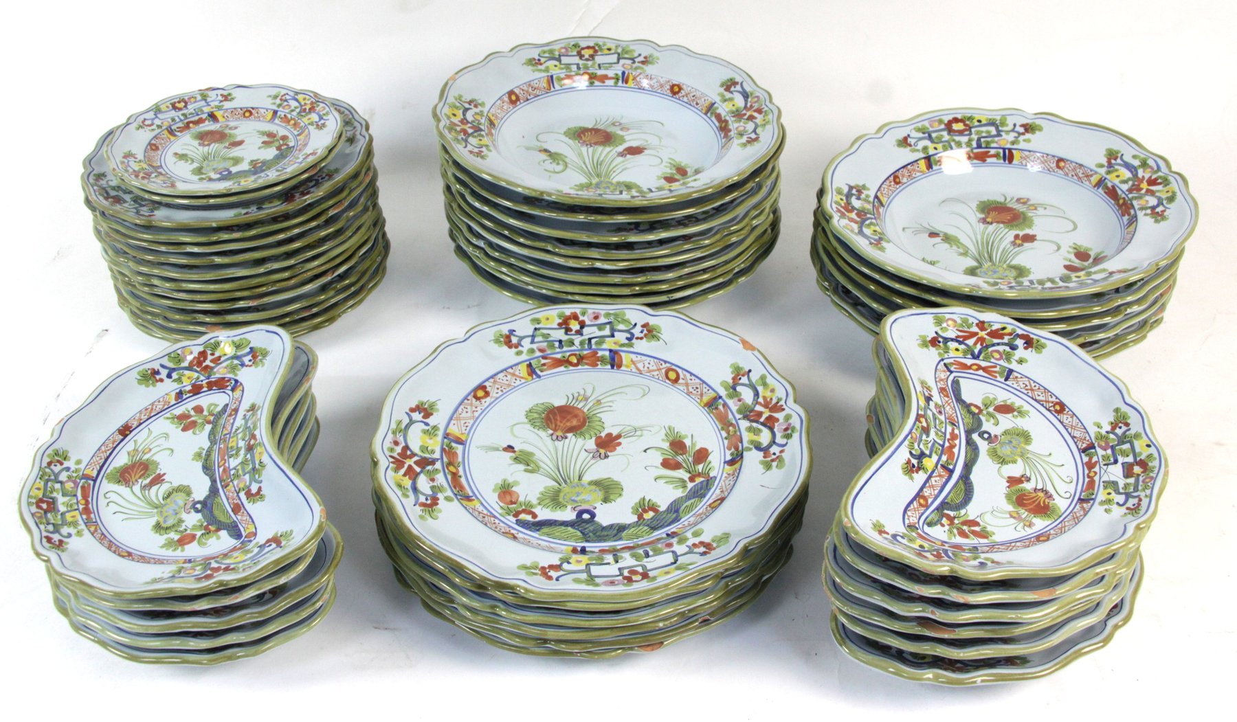 Appraisal: An Italian faience part dinner service painted with flowers comprising