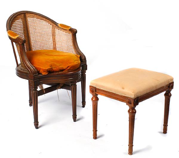 Appraisal: A Louis XVI style bergere together with a footstool damage