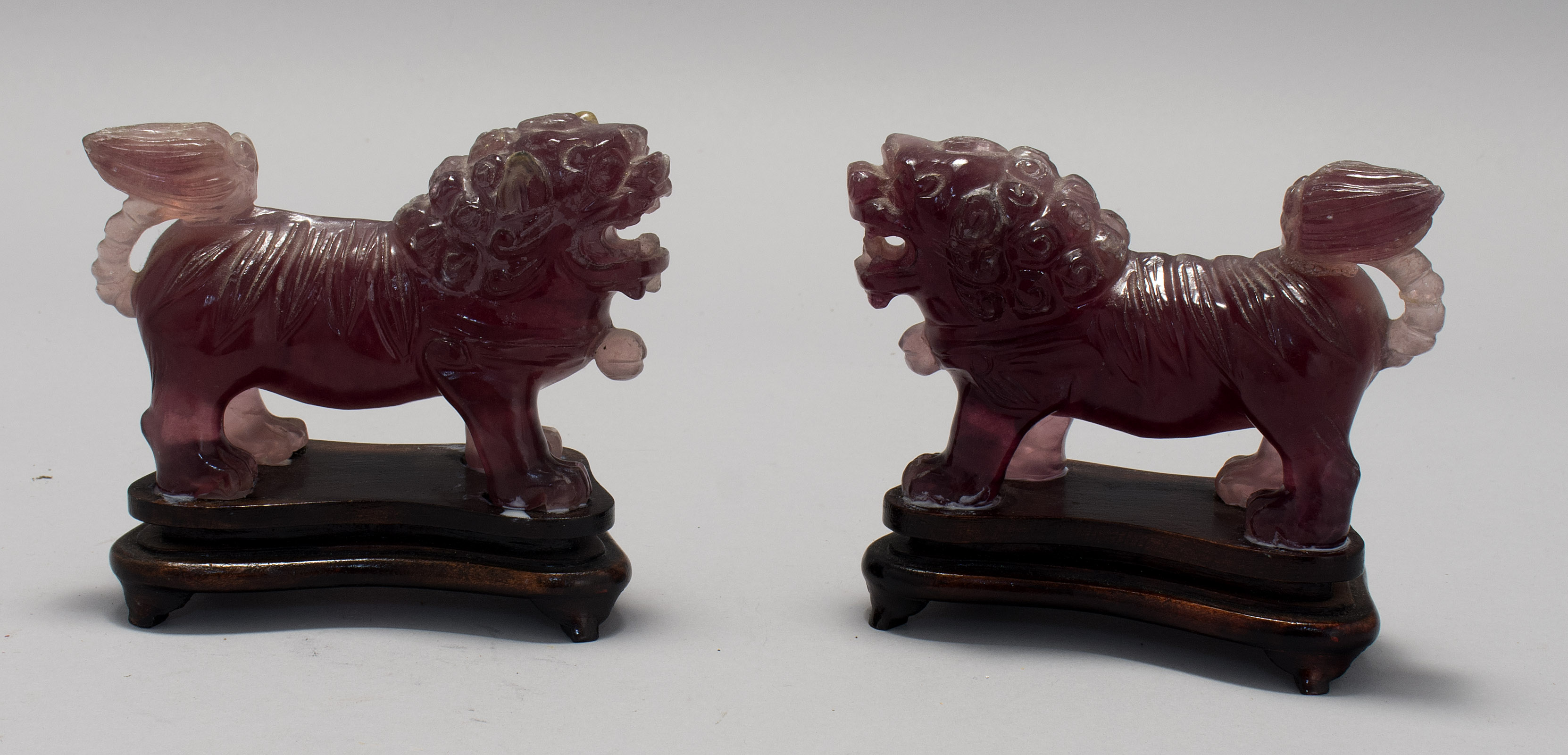 Appraisal: PAIR OF AMETHYST CARVINGS th CenturyIn the form of standing