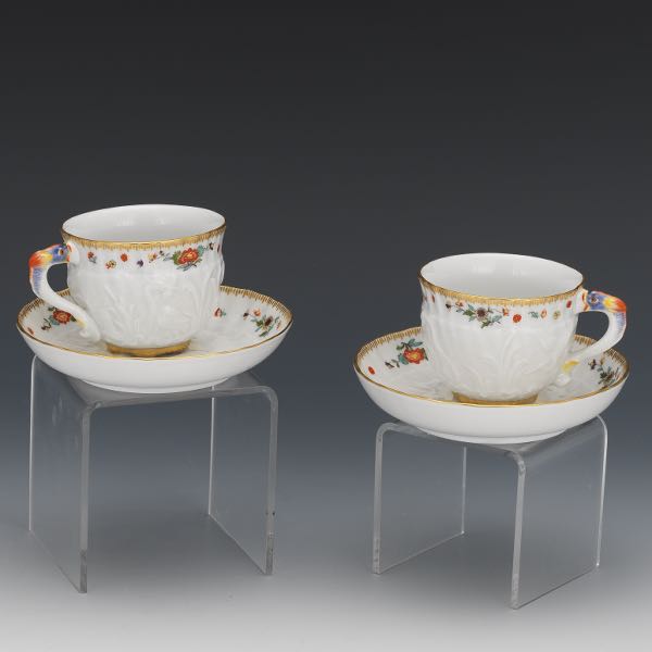 Appraisal: PAIR OF MEISSEN SWAN FLOWER CUPS AND SAUCERS With three