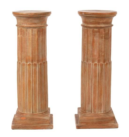 Appraisal: A Pair of Terra-Cotta Fluted Columnar-Form Pedestals Height x diameter