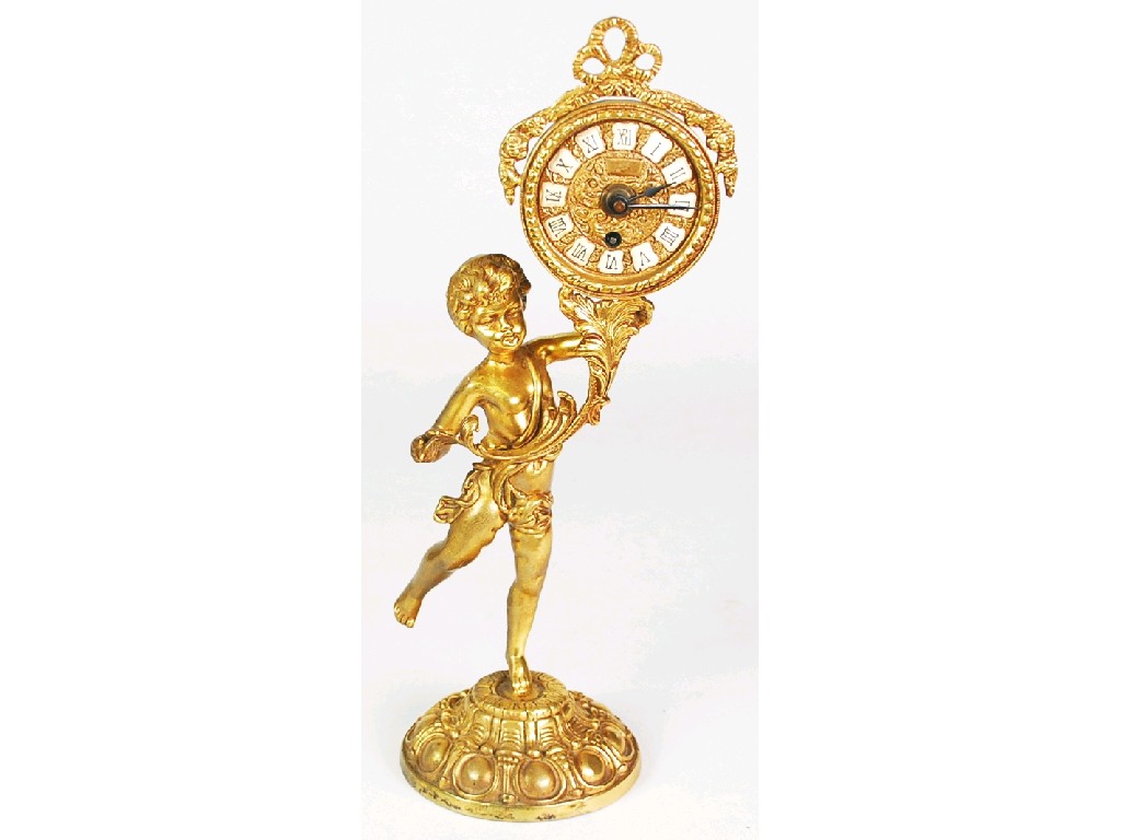 Appraisal: MODERN GERMAN CAST BRASS FIGURAL MANTEL CLOCK the dial with