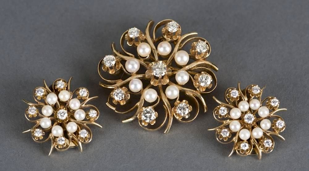 Appraisal: Pearl and diamond brooch and earring kt set A Mid