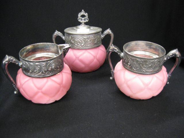 Appraisal: pcs Victorian Cranberry Quilted Art Glass creamer sugar waste silverplate