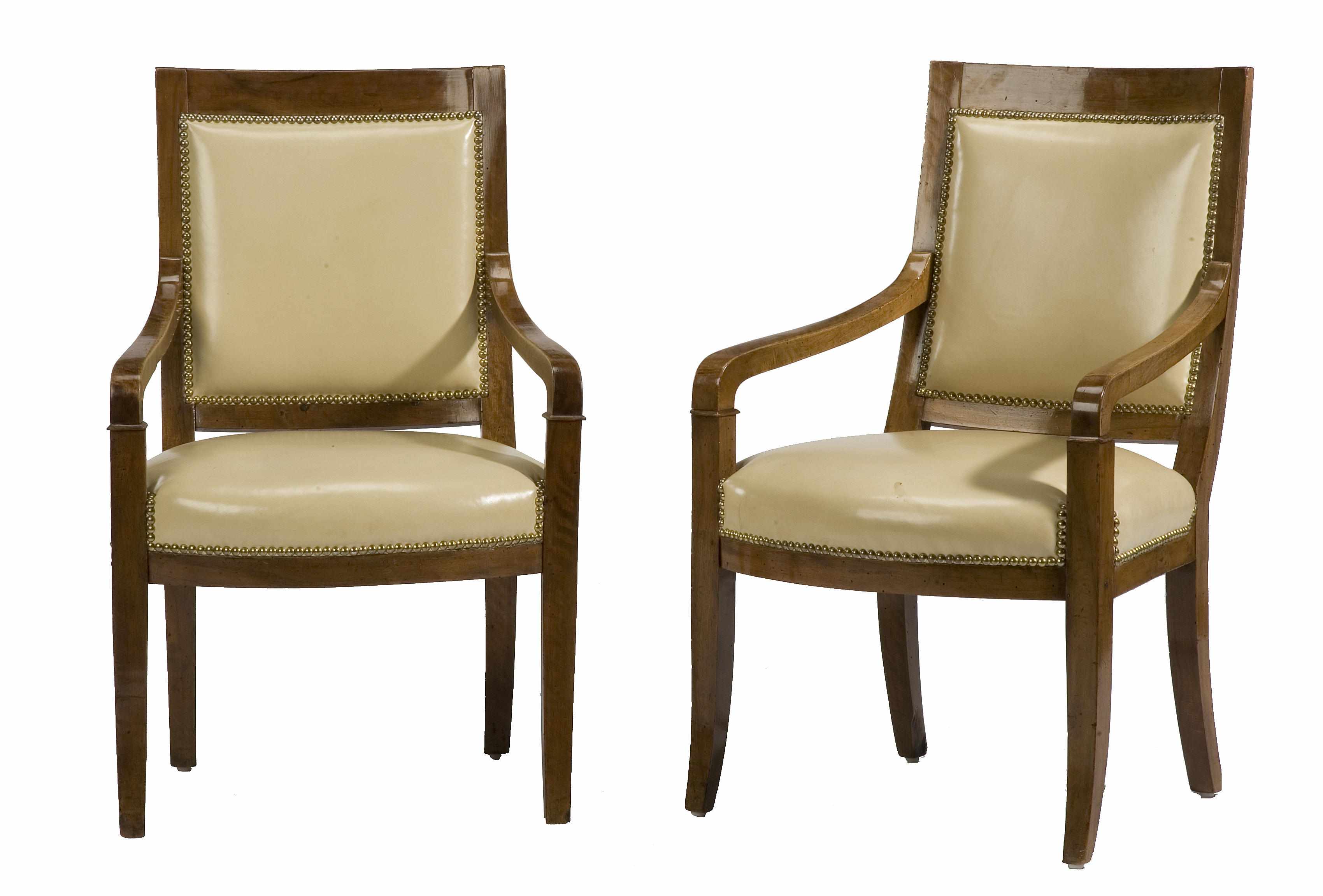 Appraisal: A pair of Directoire style walnut armchairs height in width