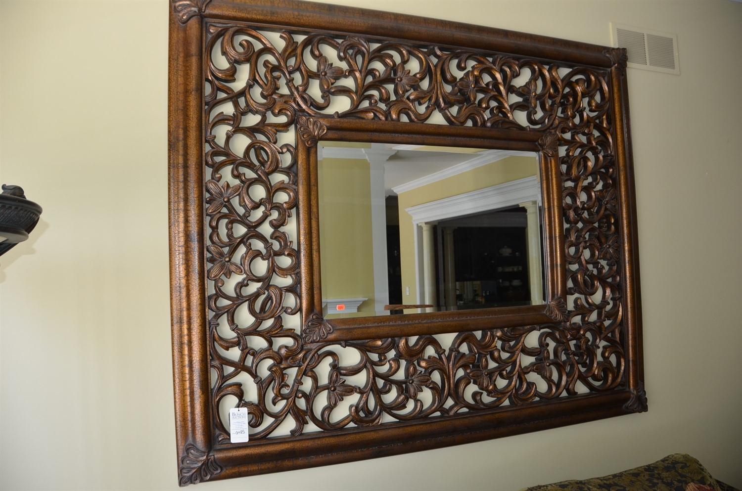 Appraisal: Large gilt finished wall mirror with floral carved pierced border