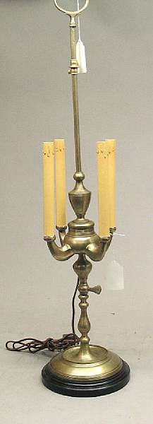 Appraisal: A four light brass adjustable lucerna table lamp The multi-baluster