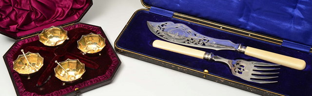 Appraisal: A CASED SET OF FOUR SILVER SALTS with fluted gilt