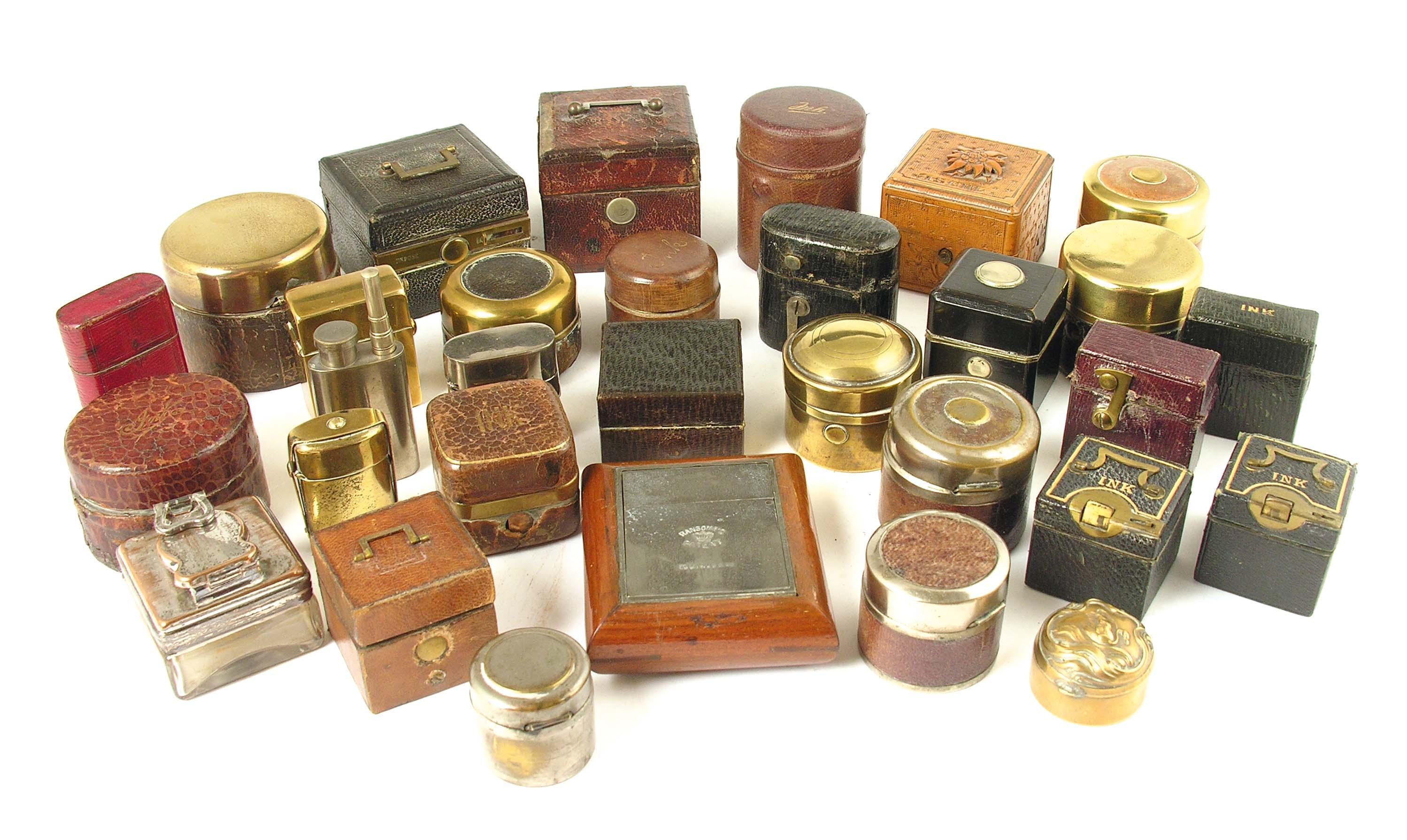 Appraisal: A collection of thirty travelling inkwells