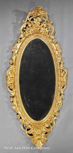 Appraisal: An American Rococo Carved Giltwood Mirror mid- th c probably