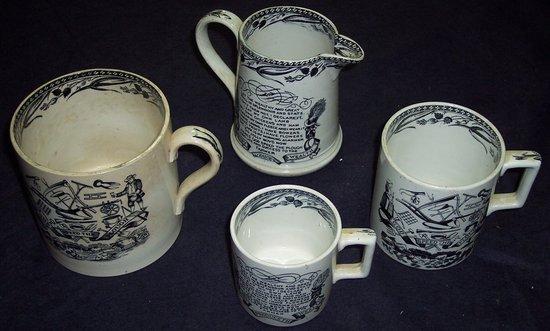 Appraisal: A 'God Speed the Plough' jug and three similar mugs