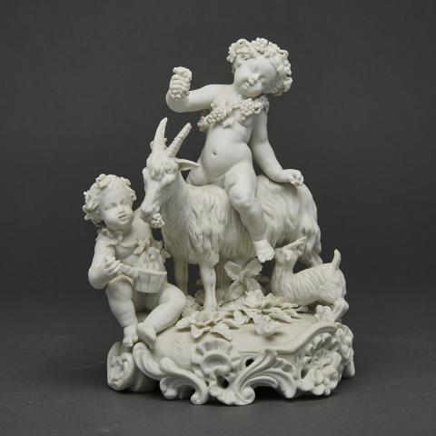 Appraisal: Continental White Biscuit Group of Young Bacchus with Attendant and