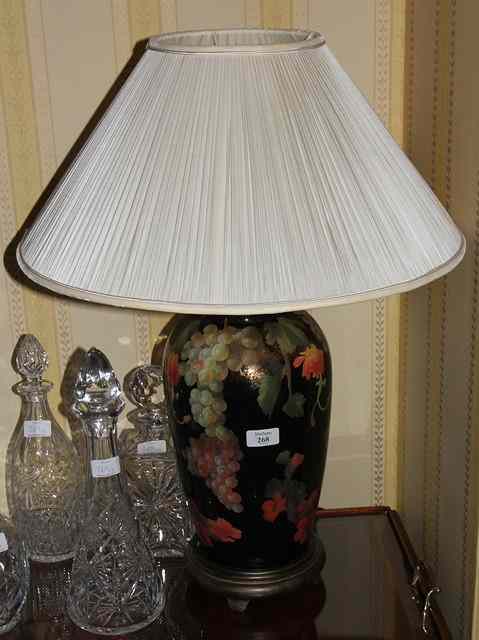 Appraisal: A GRAPE DECORATED TABLE LAMP on turned base high overall