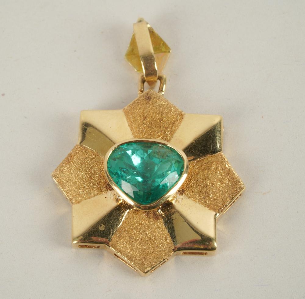 Appraisal: KARAT YELLOW GOLD EMERALD PENDANTcentering one pear-shape emerald weighing approximately