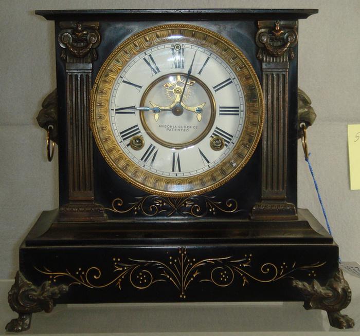 Appraisal: Ansonia black iron mantle clock open escapement t s runs