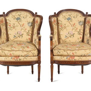 Appraisal: A Pair of Louis XVI Style Carved Walnut Berg res