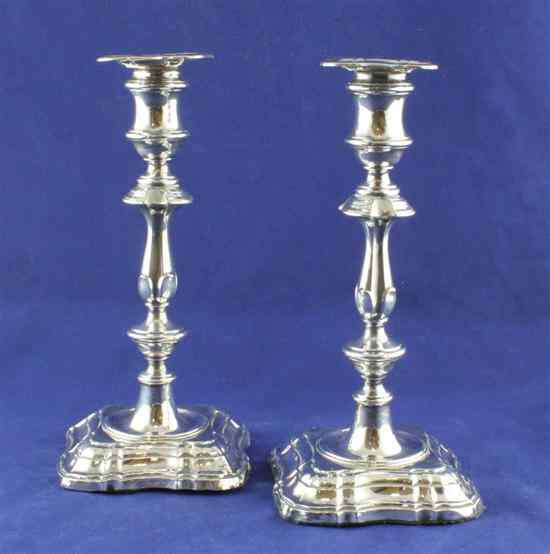 Appraisal: A pair of 's th century style silver candlesticks with