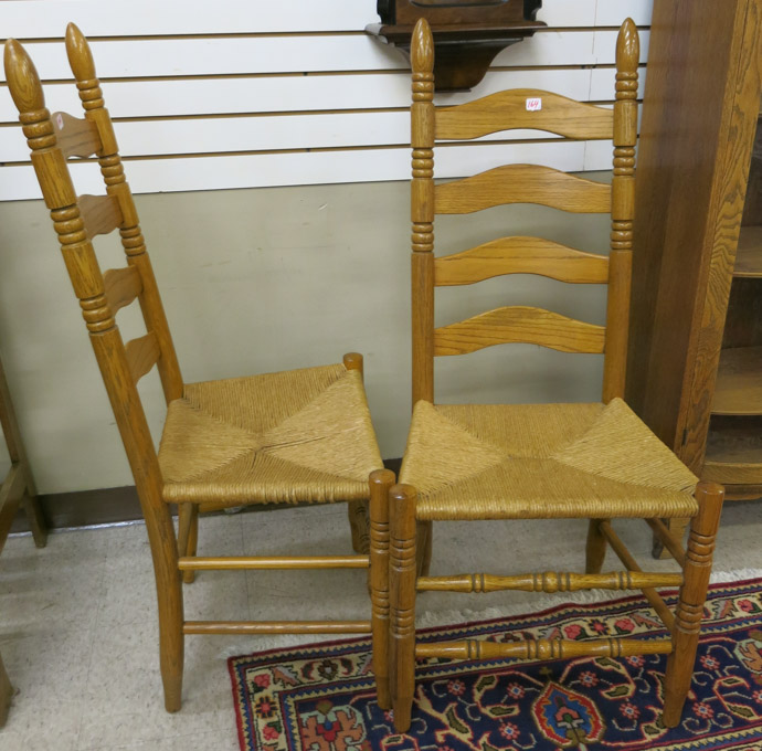 Appraisal: A SET OF FOUR LADDER-BACK DINING CHAIRS American late th