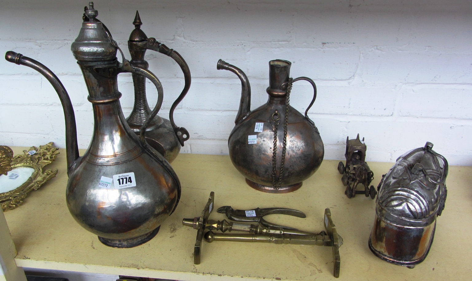 Appraisal: A group of Middle Eastern metal wares including ewers a