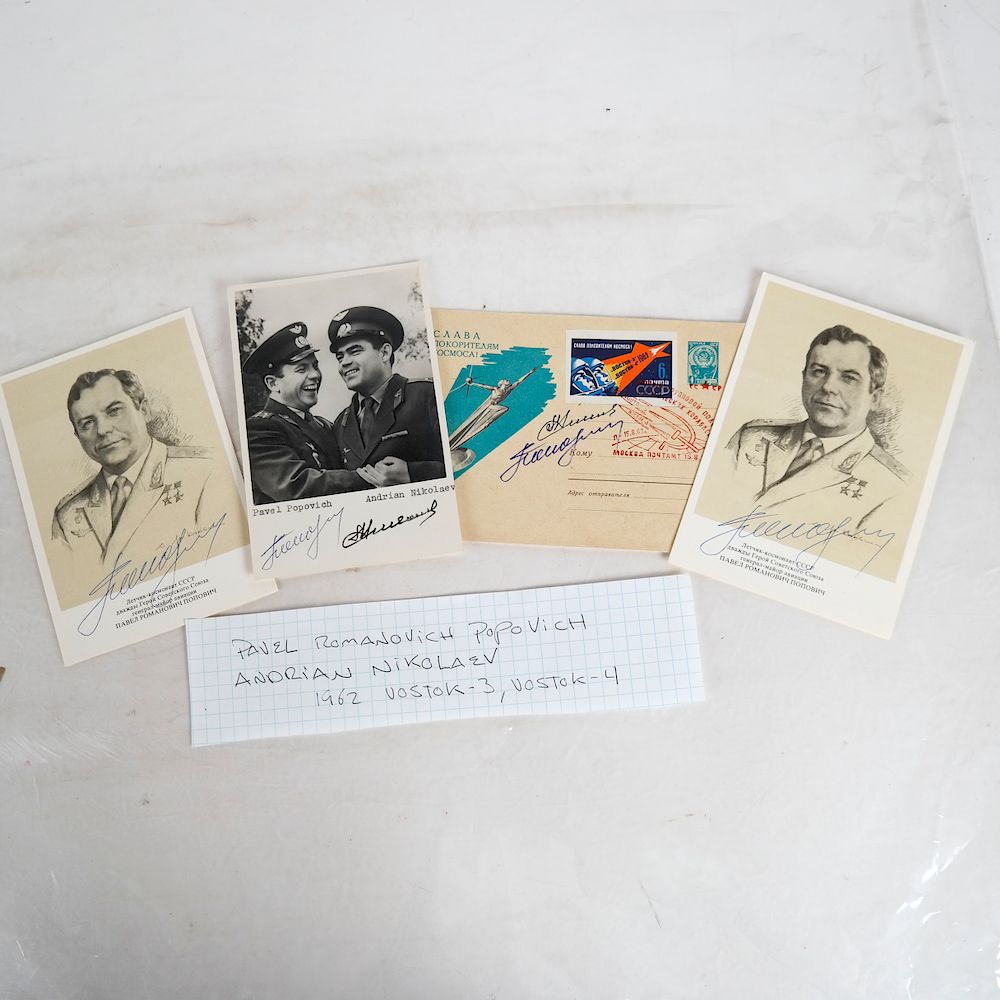 Appraisal: Four Early Cosmonaut Autograph Items Soviet Union Space Program signed