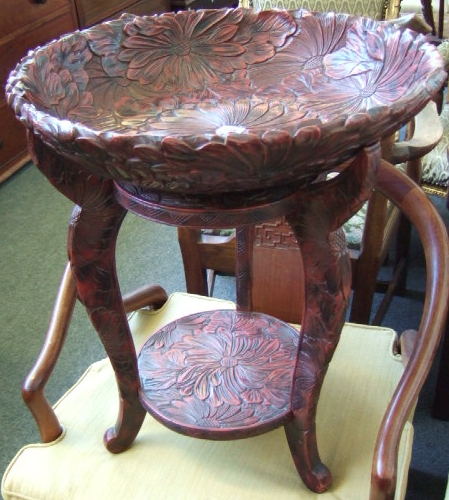 Appraisal: A Japanese composite bowl and stand relief moulded with flower