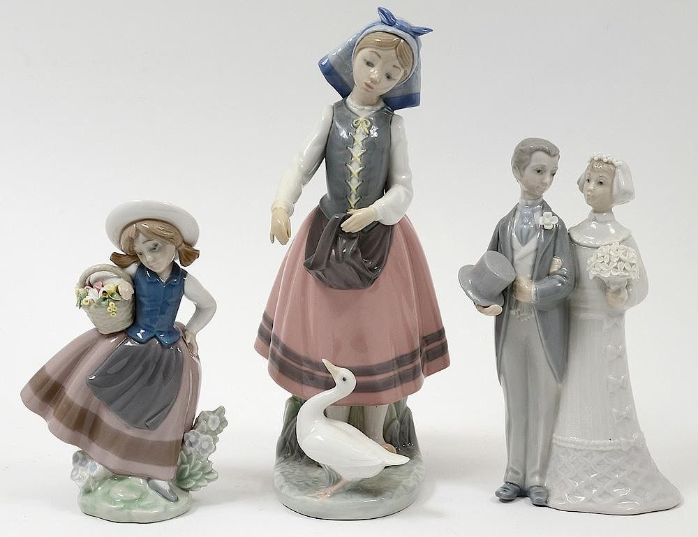 Appraisal: GROUP OF THREE LLADRO PORCELAIN FIGURES Spanish Comprising girl feeding