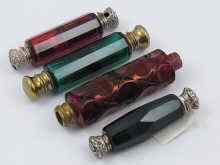 Appraisal: Four double ended coloured glass scent bottles two with white