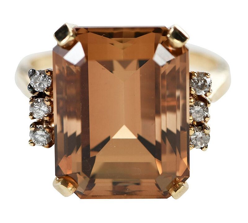 Appraisal: kt Topaz and Diamond Ring one emerald cut imperial topaz