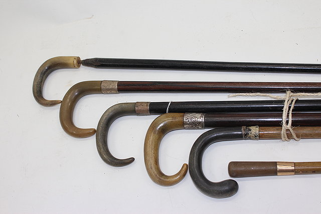 Appraisal: FIVE ANTIQUE HORN CROOK HANDLED WALKING CANES a further horn