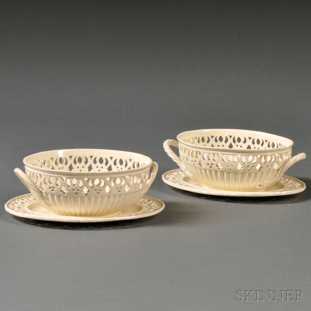 Appraisal: Pair of Wedgwood Cream-colored Earthenware Baskets and Stands England c